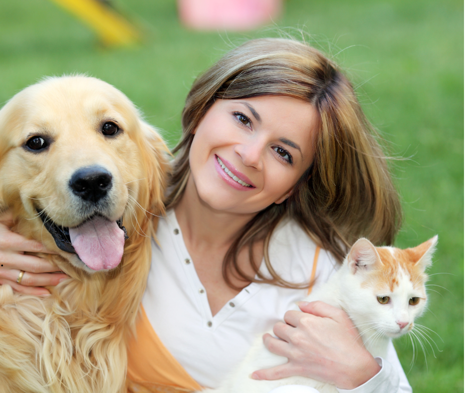 pet sitter in dallas hugs dog and cat on pet appreciation week